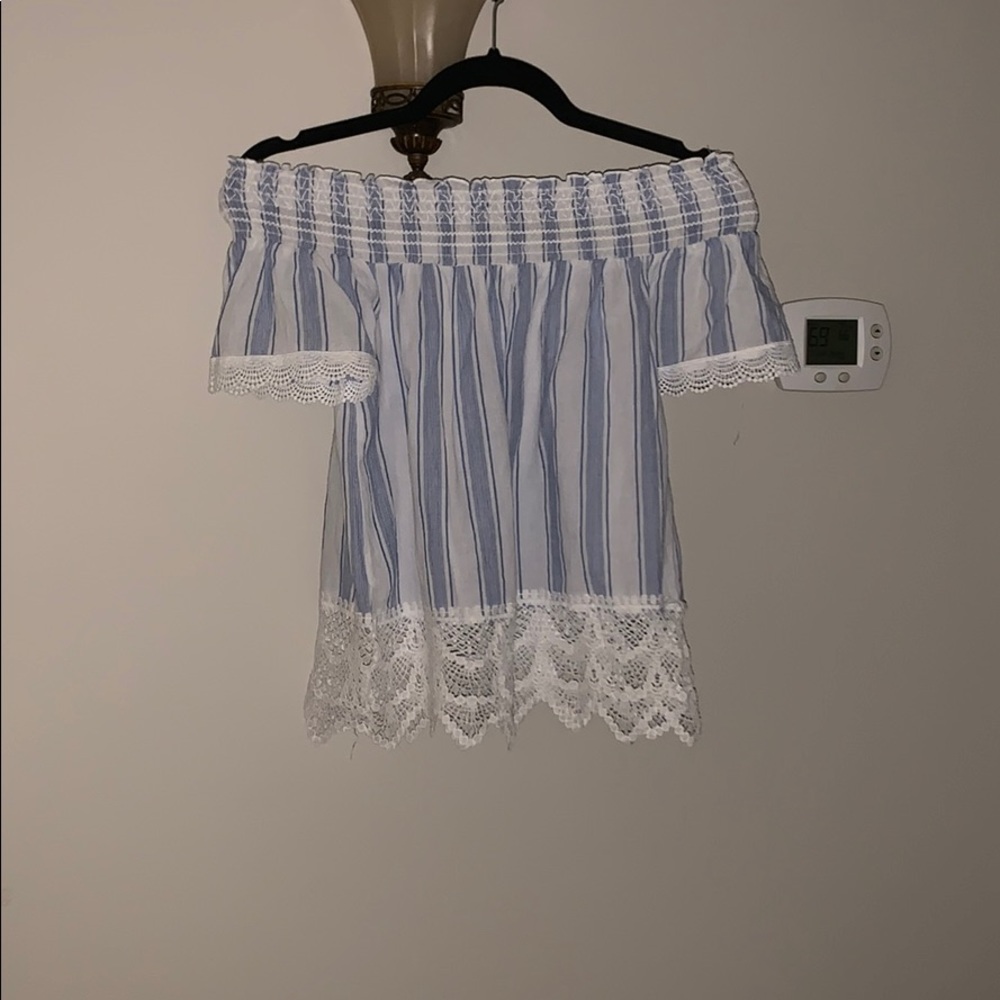 over the shoulder blue and white t-shirt